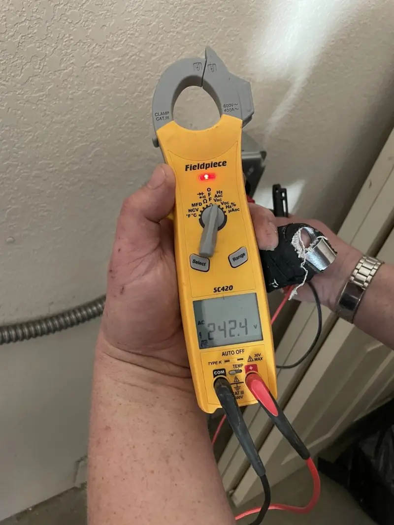 Voltage testing with clamp meter during Aluminum Wiring Replacement in Westerly